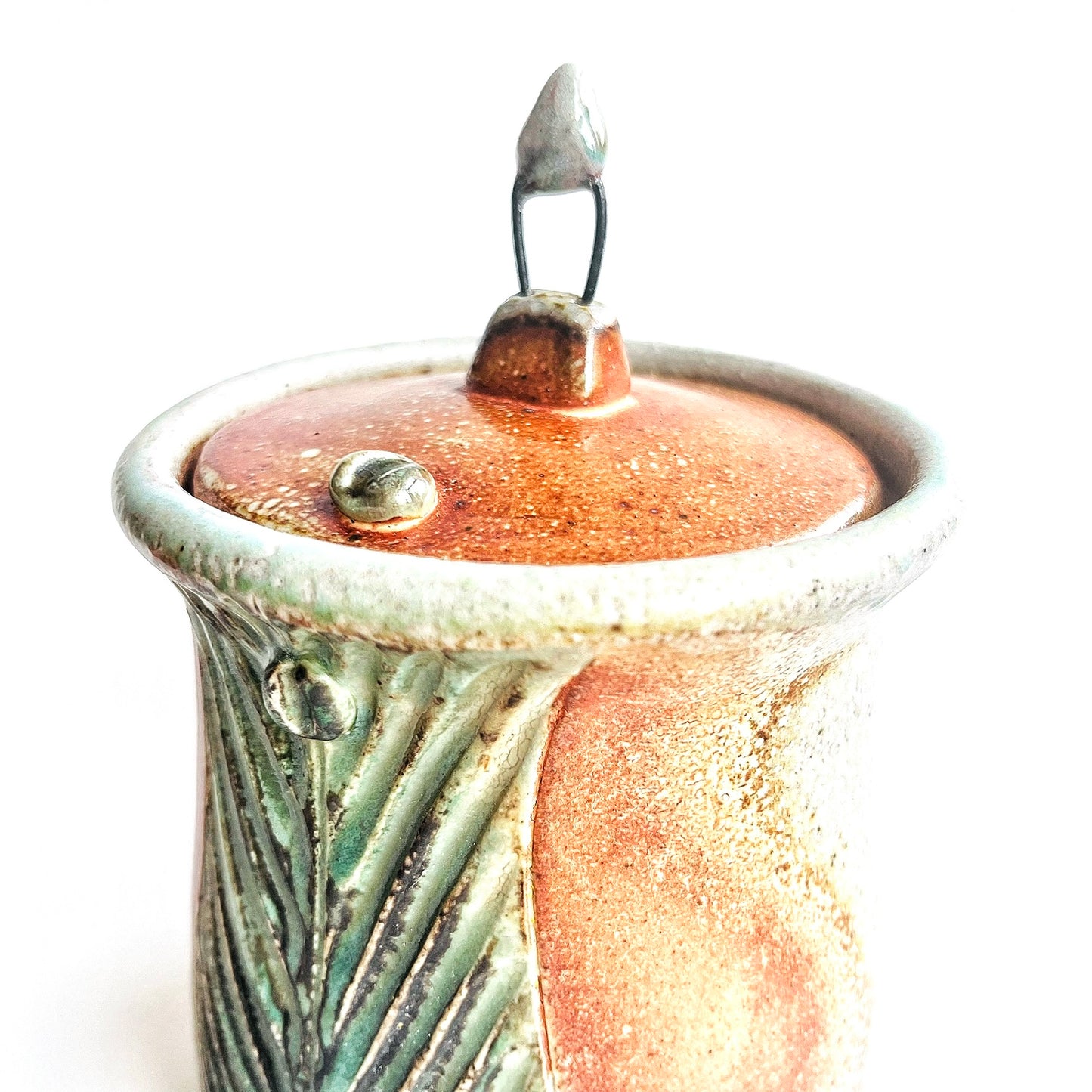 detail of a carved jar