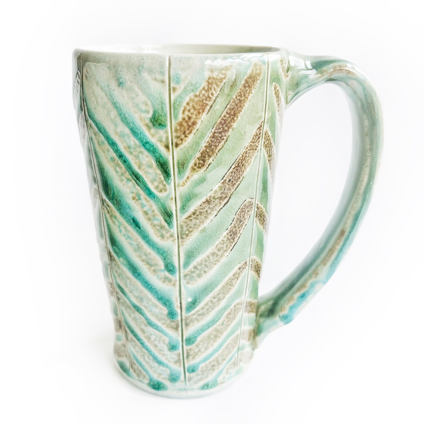 Teal green patterned mug