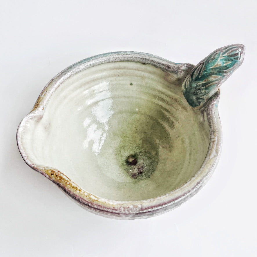 handmade pouring bowl with pitcher spout and handle