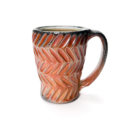 Handmade wheel thrown mug with earth tones