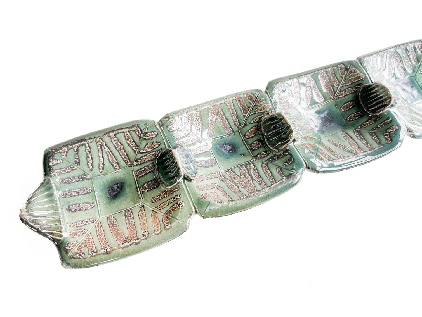 This unique green rectangle tray could be used for serving olives or cheeses, or used as table centerpiece.