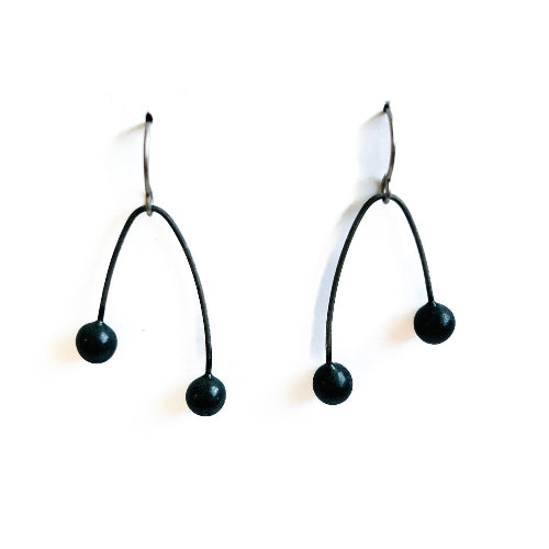 Black seed drop earrings