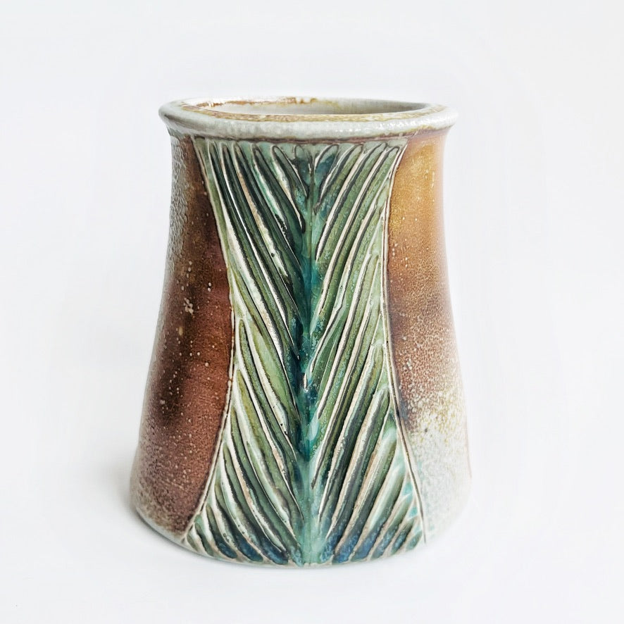 Oval flower vase with flowers displayed