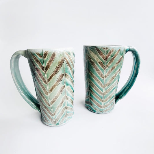 Teal green patterned mug