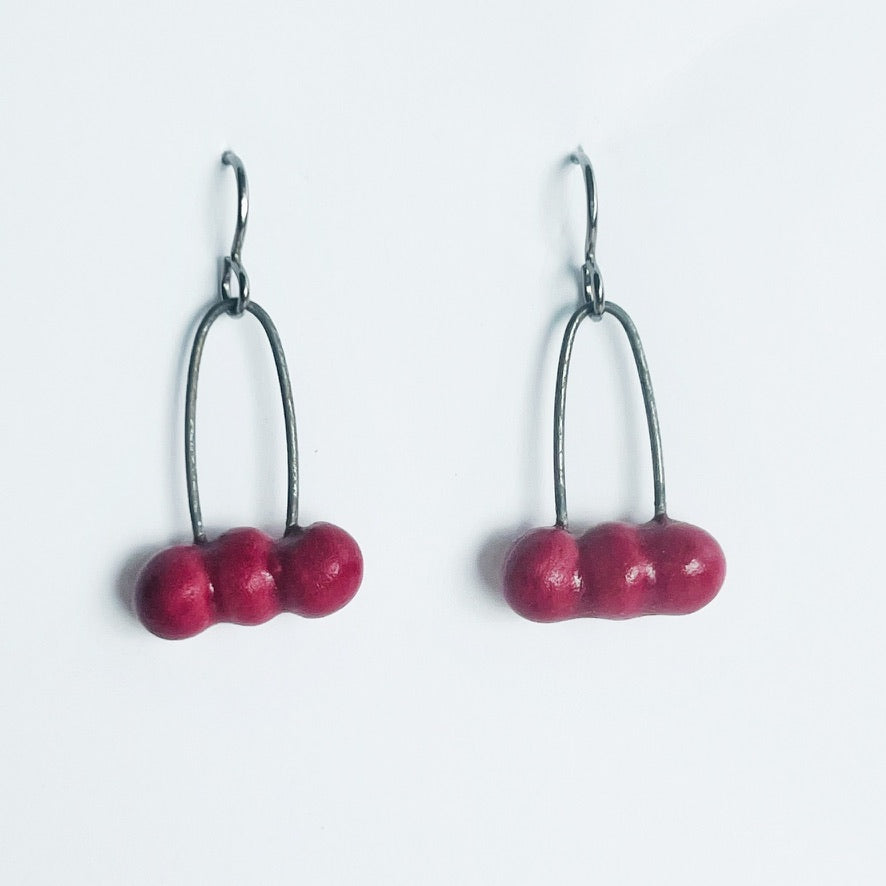 red seed dangle earrings