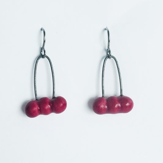 red seed dangle earrings