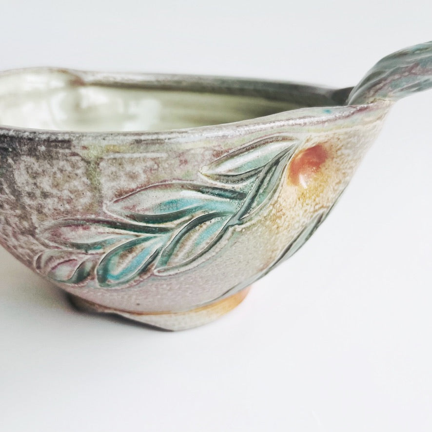 handmade pouring bowl with pitcher spout and handle