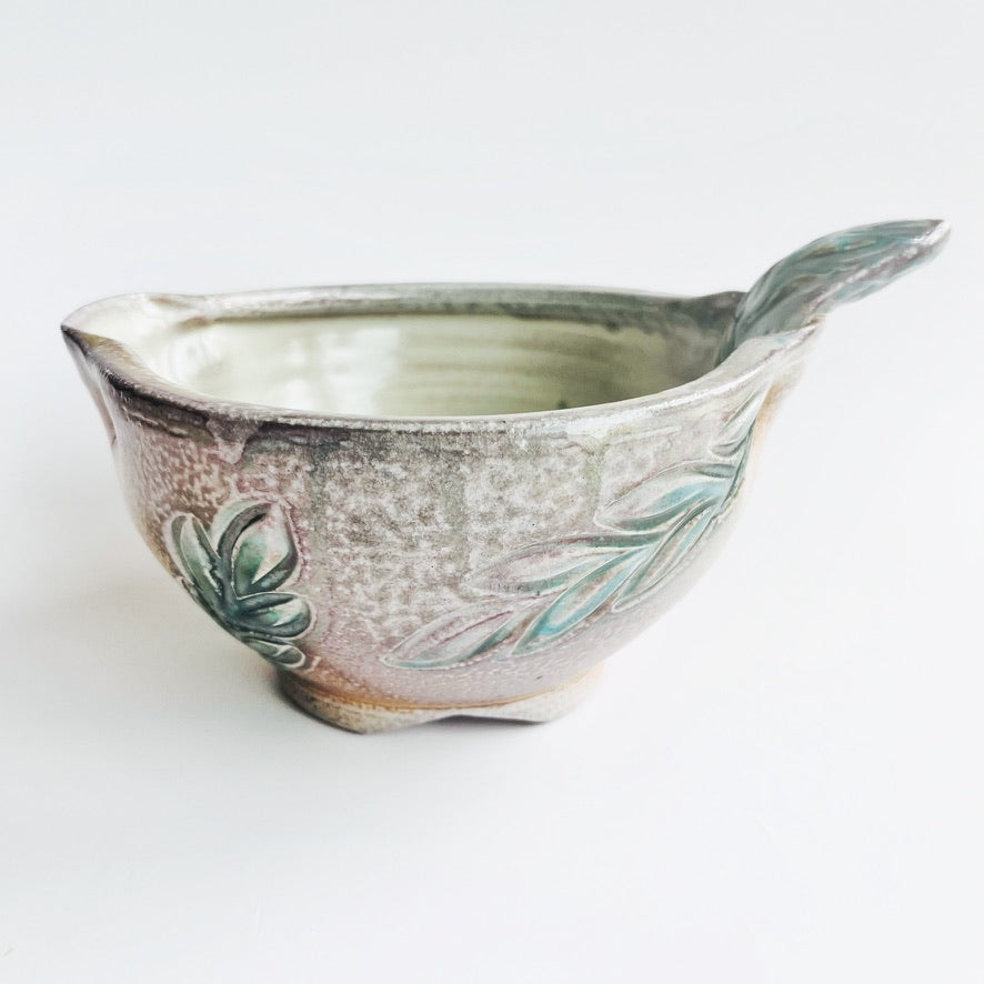 handmade pouring bowl with pitcher spout and handle