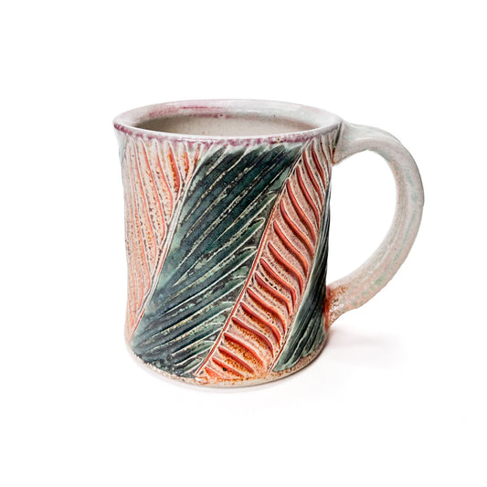 Handmade wheel thrown mug, green leaf patterned glaze and earth tones