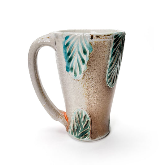 Handmade wheel thrown tall mug, green leaf patterned glaze and earth tones