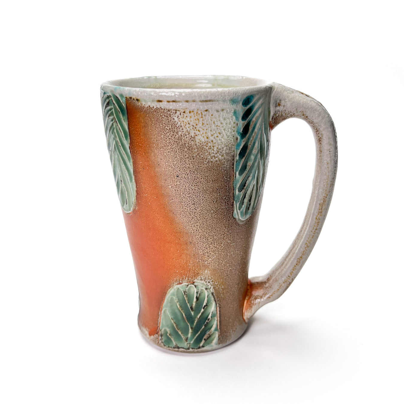 Handmade wheel thrown tall mug, green leaf patterned glaze and earth tones