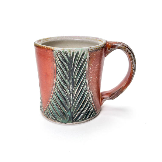 Handmade wheel thrown mug, green leaf patterned glaze and earth tones