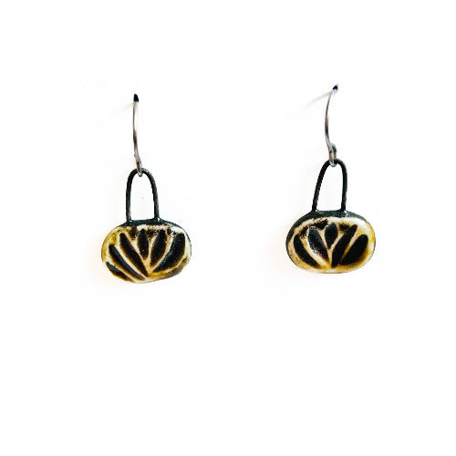Amber carved oval earrings