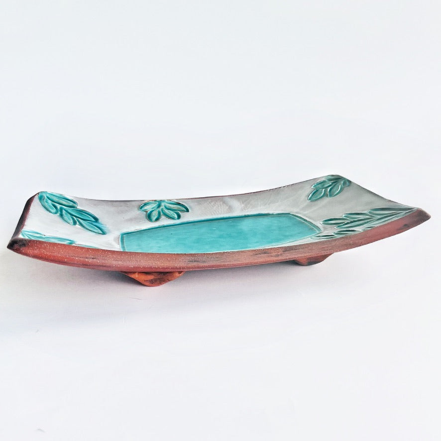 rectangle dish with turquoise leaf and white glaze details