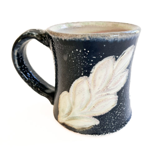 ceramic mug handmade with black and white leaves