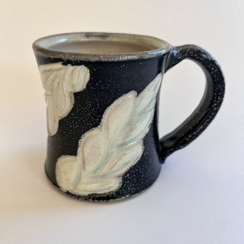 ceramic mug handmade with black and white leaves